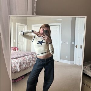 Princess Polly star shot long sleeve graphic top